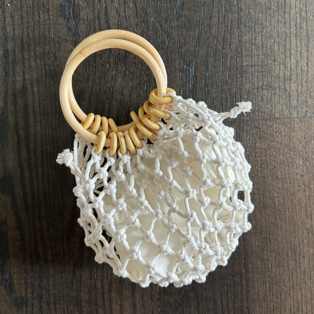 Open weave wooden handle bag